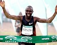 Kipsang reigns in Seville rain