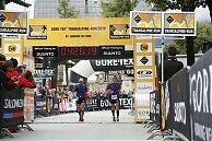 Ben Abdelnoor and Billy Burn cross the st.1 finish line