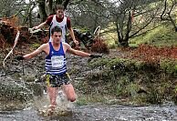 Jonny leads Tom on the last river crossing